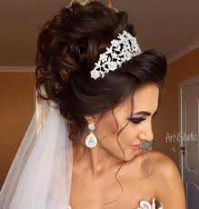 One of the wedding hairstyle for short hair with a veil would be not to try a complicated hairdo, but rather pair this hairstyle with the classic princess wedding gown and a tiara to pull of the perfect fairy tale look. Curly Wedding Updo With Tiara And Veil Weddinghairupdos Curly Wedding Updo Wedding Hairstyles For Long Hair Bride Hairstyles Updo