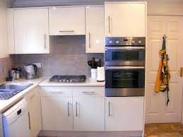 Another stylish element adding some heat to this kitchen is the. Neue Kuche Kabinett Turen Uberprufen Sie Mehr Unter Http Kuchedeko Inf New Kitchen Cabinet Doors Kitchen Cabinet Doors Only Replacement Kitchen Cabinet Doors