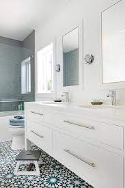 Here are a few breathtaking blue bathroom tile designs for you to consider while designing or renovating your bathroom. White And Blue Mosaic Bath Floor Tiles Transitional Bathroom