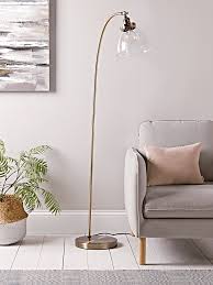 You can use a broom, rag, or vacuum cleaner to sweep the glass into unplug the lamp if the fixture is plugged into the wall. Domed Glass Floor Lamp Brass