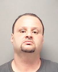 Police snare 'habitual criminal' hiding drugs, gun