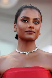 Simone Ashley On Therapy, Big Fluffy Coats And Her Daily Steaming Ritual  For Clear Pores