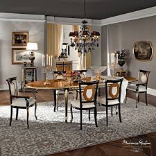For a dining area, think a distressed farmhouse dining table, slipcovered chairs, an antiqued oriental rug, and spindle dining chairs. Classic Dining Table Casanova Modenese Interiors Luxury Furniture Solid Wood Oval Extending