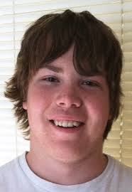 Young man aids fallen horseman near Letcher