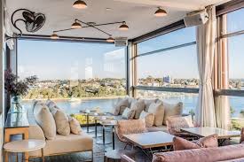 A beer, but add a view. The Best Rooftop Bars In Sydney Vogue Australia
