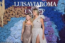 Heidi started a storm when she arrived for the event at la certosa di san giacomo, working all her angles while standing near a beautiful wall of flowers. Em9bq3ltwux5sm