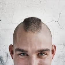 This voluminous men's hairstyle is clipper cut high up through the sides and back. Five Go To Haircuts For Basketball Players