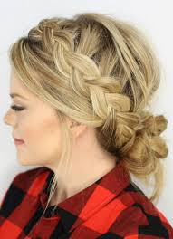 Braid your hair with a weave to add fullness and length to the style. Dutch Braids And Low Messy Bun Hair Styles Side Bun Hairstyles Hair Tutorial