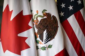 In the middle of the white stripe, there is a national emblem depicting an eagle clutching a snake in its talons and beak. U S Canada And Mexico Win Joint Bid To Host 2026 World Cup Pbs Newshour