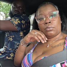 There is this guy stopping cars at the lights of Cove and River rd, asking  for money. Almost got hit by cars a bunch of times. I believe is creating a  problem