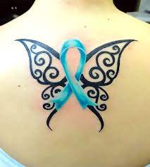 A breast cancer tattoo is personified as a woman doing a rude hand gesture to show the wearer's emotions towards cancer. Tribal Breast Cancer Butterfly On Back Tattoo Idea
