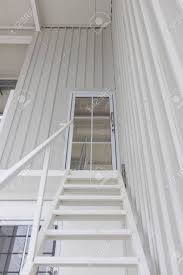 Building glass stairs and staircases with glass parts is a big challenge for fabricators and designers. Metal Door Decorated With Glass On The Top Floor Next To The Stock Photo Picture And Royalty Free Image Image 134585027