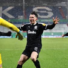 Because of the white background, details such as the official thw kiel club logo and the classic hummel® chevrons immediately catch the eye. Holstein Kiel Knocks Bayern Munich Out Of Dfb Pokal On Pks Sports Illustrated