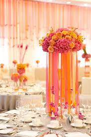 Indian And Chinese Wedding Inspiration Pink Red And Orange Knotsvilla Wedding Ideas Canada Wedding Blog Orange Wedding Centerpieces Pink Wedding Decorations Orange And Pink Wedding