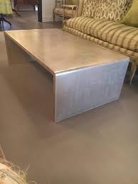 The dining table offers a bold update to your dining room. Waterfall Coffee Table With Silver Leaf Finish For Sale At 1stdibs