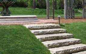 The clean design of these stairs is perfect for these stone steps combine well cut stone with rough textured stone. Stone Steps Area Landscape Supply