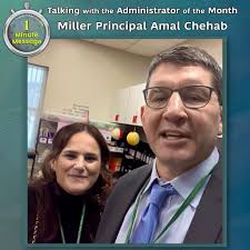 Dr. Maleyko talks with the Administrator of the Month, Amal Chehab,  Principal at Miller Elementary.