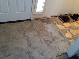 Remove all tiles around bath and shower, cut a neat vertical line up the tiles to the left of teh toilet and. New Subfloor Slate Tile Disaster Diy Home Improvement Forum