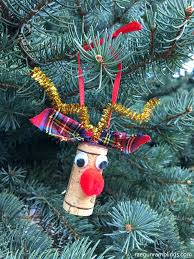 Each ornament includes a festive ribbon for hanging. Rudolph Reindeer Wine Cork Craft Ornament Rae Gun Ramblings