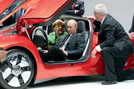 Second most powerful president on the universe, vladimir putin, was did the the president was away from his official duties and from nowhere, he appeared at a petrol station in moscow with a small. Russian President Putin Checks Out Vw S Xl1 Together With German Chancellor Merkel Carscoops