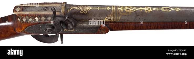 A Persian, gold-inlaid percussion rifle, 19th century, Round, rifled Damascus barrel in 17 mm calibre with cannon muzzle. The surface of the barrel inlaid with knotted ribbon ornaments and arabesques in gold.