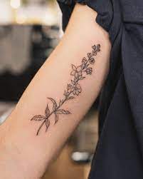 Steph Black Tattoo On Instagram Delphiniums For Isabella From A While Ago Mom Tattoos Mommy Tattoos Tattoos