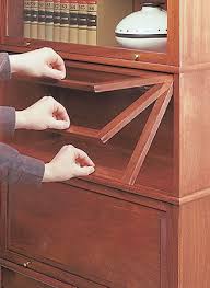 Detailed project plans illustrate the construction of the cases and pulley system, and a side article by alec waters details the guides that align overhead doors. Barrister S Bookcase Woodworking Project Woodsmith Plans