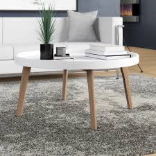 Round tables are easy to move. Turn On The Brights Julianna Raised Edge Coffee Table Reviews Wayfair Coffee Table Small Coffee Table Coffee Table White