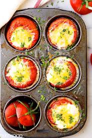 Place one egg in each cup in a muffin tin. Baked Eggs In Tomato Cups Recipe Diethood