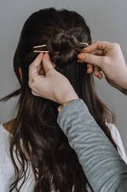 How to make diy fabric hair bun maker and holder.you can make a hair bun like magic in a few minutes with just some scrap fabric, craft wire and a few simple. How To Do A Half Up Bun With A Pin An Indigo Day