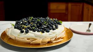 1 blitz the biscuits in a food processor until beginning to turn to crumbs, then add the butter and whiz again to make the mixture clump. Lemon Pavlova With Blueberries Simply Nigella Cookbook Youtube