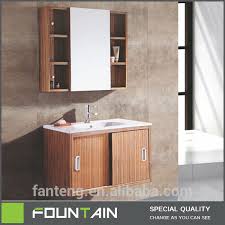 The cabinet is located at the corner most part of the bathroom with a plush mirror bordered in silver. Slide Door New Design Hanging Cabinet Mirrors Rustic Bathroom Vanities Buy Rustic Bathroom Vanities Mirror Cabinets Hanging Bathroom Vanities Product On Alibaba Com