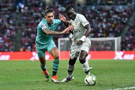 Amine ferid gouiri (born 16 february 2000) is a french professional footballer who plays as a striker for ligue 1 club nice and the france u21 national team. Hector Bellerin Stanley Nsoki Hector Bellerin And Stanley Nsoki Photos Zimbio