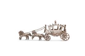 LOT:0 | MINIATURE SILVER A couch and ...