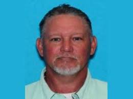 Alabama triple murder suspect surrenders; woman charged with hindering  prosecution