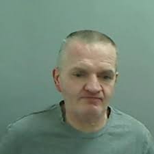 Woman hit over head with a hammer during armed gang attack