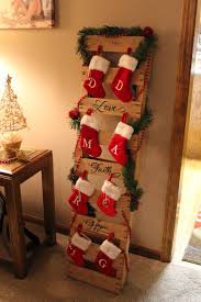 A Pallet Turned Into A Stocking Holder I Would Love To Do This For My Moms House As More Cheap Christmas Diy Diy Christmas Decorations Easy Easy Christmas Diy
