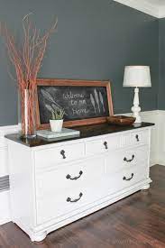 Six polished stainless steel feet. Refinished Dresser Reveal Erin Spain