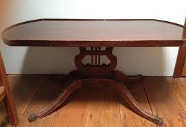 The post on top adds 2 1/2. Antique Mersman Oval Coffee Table Harp Design Mahogany Lion Claw Feet 1826264313