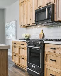 Black And Light Wood Kitchen Cabinets Matte Black Appliances Yes Or No Let Us Know In The Comments Either Way Love This Design From Jor Wood Kitchen Hickory Kitchen Cabinets Light Wood Cabinets
