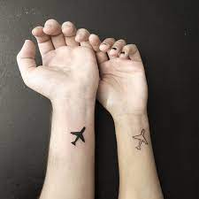 128 Travel Tattoo Ideas That Will Make You Want To Pack Your Bags Asap Matching Couple Tattoos Airplane Tattoos Couple Tattoos