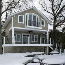 Home Addition After We Bumped Out The Second Story For An Expanded Master Bedroom We Added New Deckin Master Suite Addition Second Story Addition Lake House