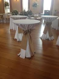 Doug Olinde Tents Llc Tall Boy Tables With 132 White Linens Tied With Burlap Ribbon At Lou Cocktail Table Decor Wedding Cocktail Tables Wedding Party Table
