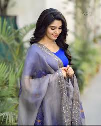 Uppena movie actress krithi shetty half saree stills at the movie pre release event. Krithi Shetty Actress Photos