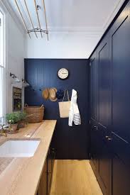 Another typical location is adjacent to the garage and the laundry room serves as a mudroom for the entrance from the garage. Perfect Small Laundry Room Space Savvy And Stylish Designs