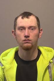 Miller charged in Facebook feud