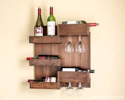 Wooden pegs hold your wine glasses on display. 40 Diy Wine Rack Projects To Display Those Lovely Reds And Whites