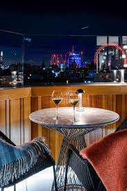 Both bars are packed with classic arcade games and retro consoles, all operated using us quarters you can get at the bar. The Best Bars In London To Visit This Winter Jetsetter Rooftop Bar Design London Bars Best Rooftop Bars