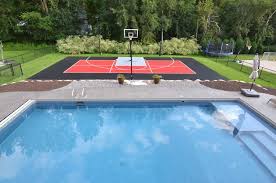 Our courts are constructed from ¾ shock absorbing tiles that reduce fatigue, which. Pool Basketball Court Patio Unique Outdoor Courts Game Millz House Snapsports Nba Small Backyard In 2020 Backyard Pool Swimming Pool Builder Basketball Court Backyard