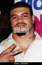 San Diego Chargers' Shawne Merriman makes a diving interception after  teammate Terrence Kiel (48) made the hit